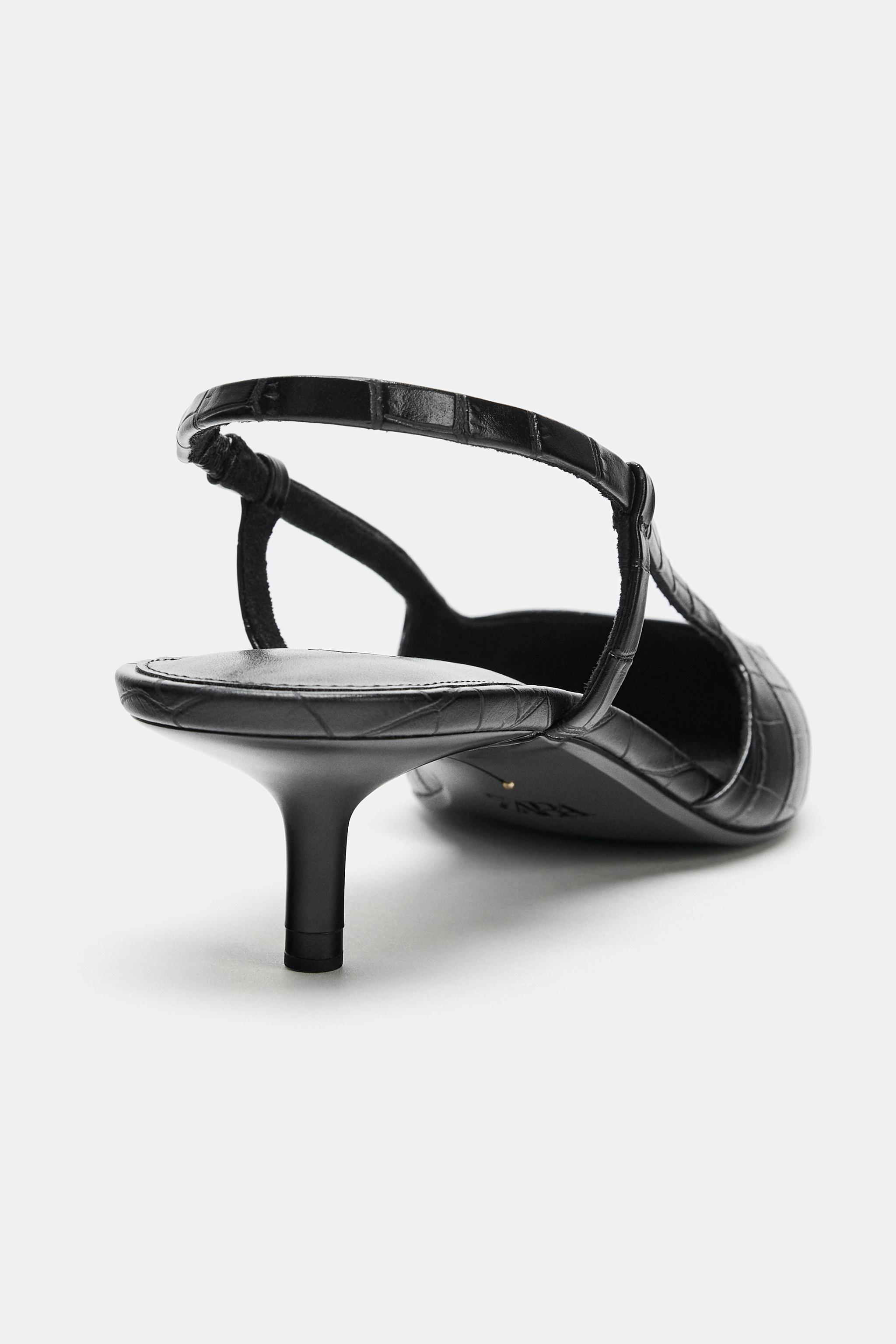 EMBOSSED SLINGBACK HEELS